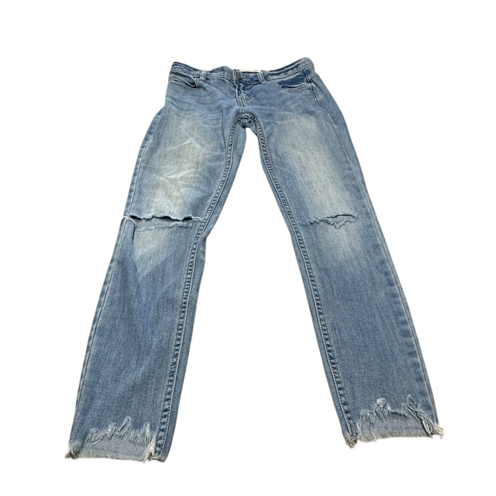 Free People Distressed Blue Jeans with Fringe Bottoms